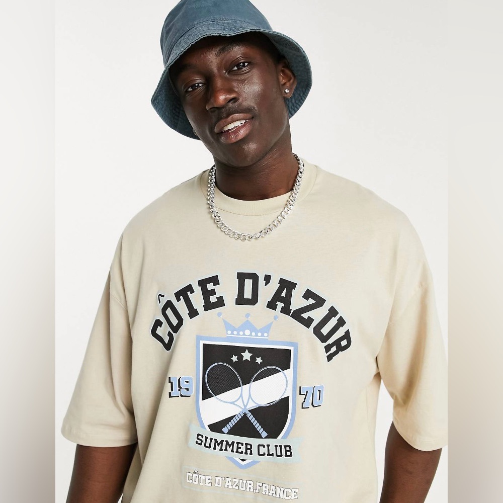 ASOS DESIGN oversized t-shirt in beige cotton with collegiate tennis print
